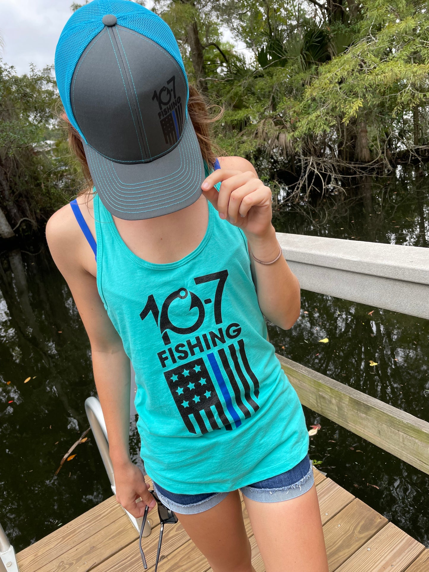 Neon blue flag logo trucker hat